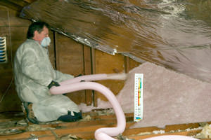 Fiberglass Insulation being used to add energy efficiency to an attic in Nanuet